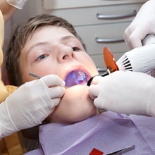 boy getting dental bonding