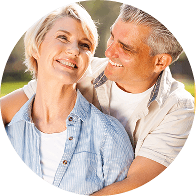 Smiling adult man and woman outdoors