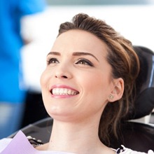 woman smiling in dental chair