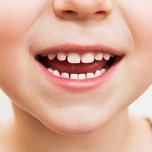 Closeup of child's healthy smile