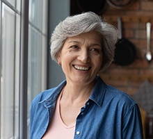 Woman smiling with dentures