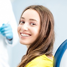 Smiling woman in dental chair