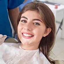 Smiling woman in dental chair