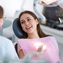 a patient smiling before undergoing sedation dentistry in Virginia Beach