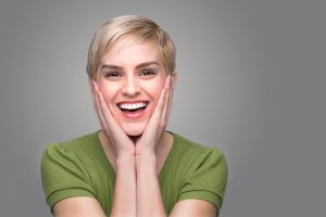 How can porcelain veneers in Virginia Beach help my smile? 