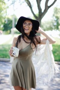 Woman with attractive smile in summer dress