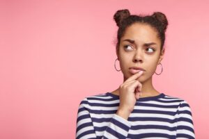 Woman wondering if veneers can straighten her teeth